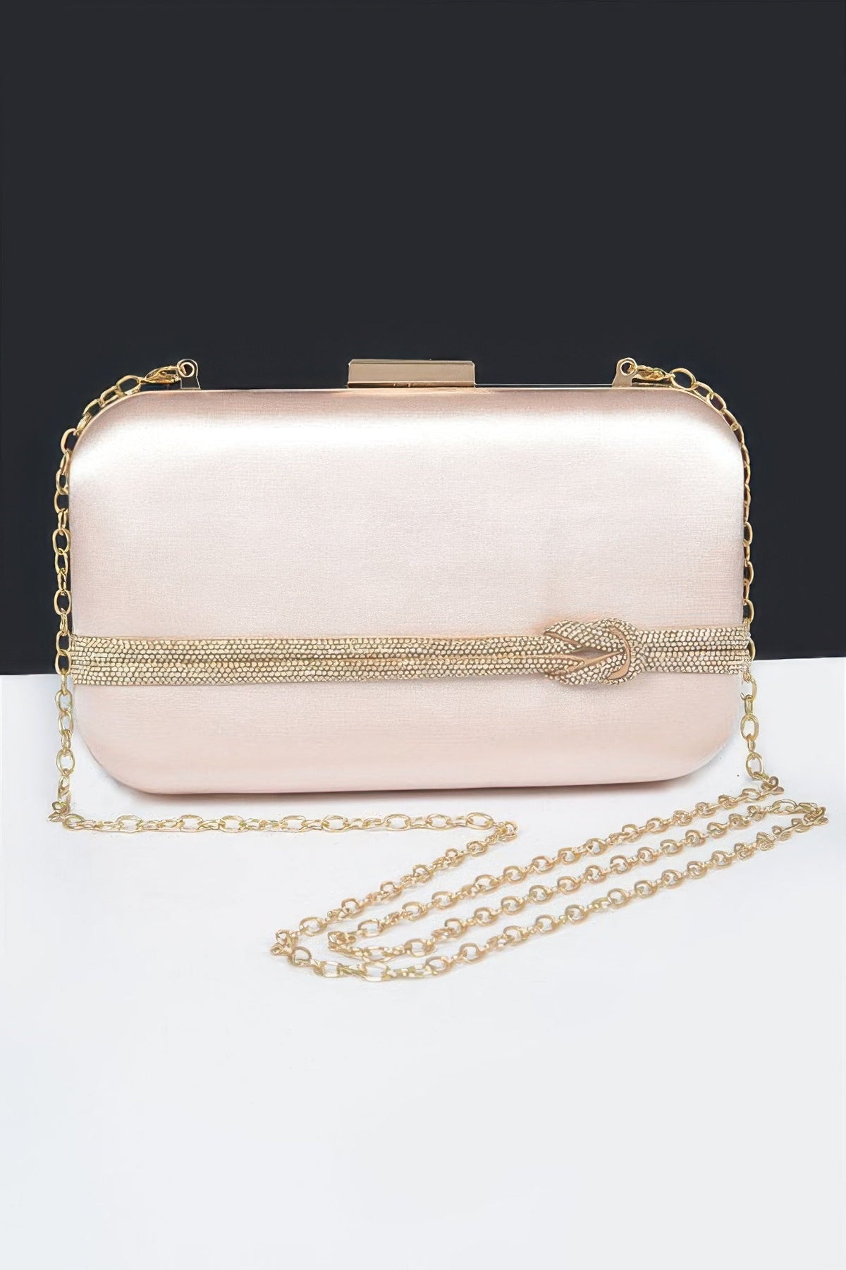 Gold satin frame clutch with rhinestone chain strap and top clasp closure