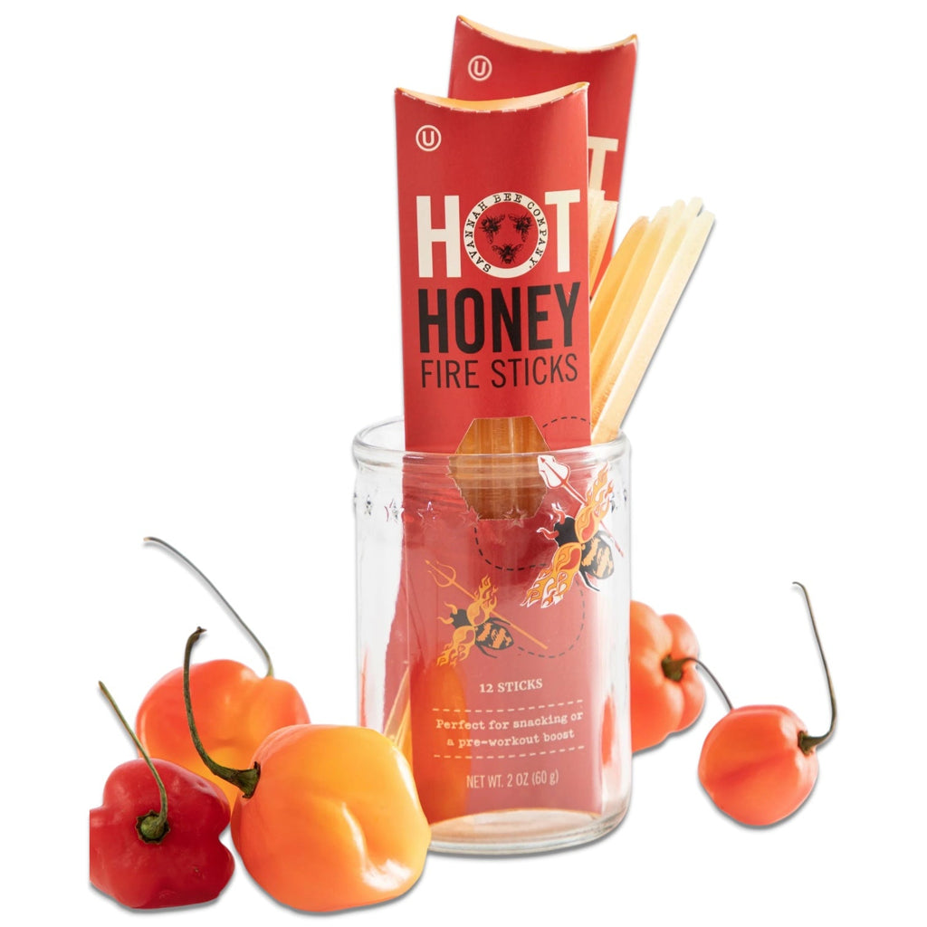 12-pack hot honey fire sticks jar display with red packets and honey-stick bundles
