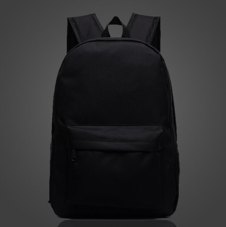 Luminous school backpack in black, front zip pocket, padded straps, top handle