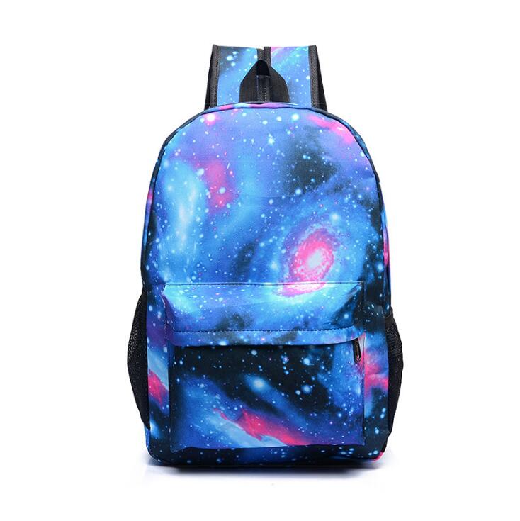 Luminous school backpack in blue galaxy space print, front zip pocket, padded straps