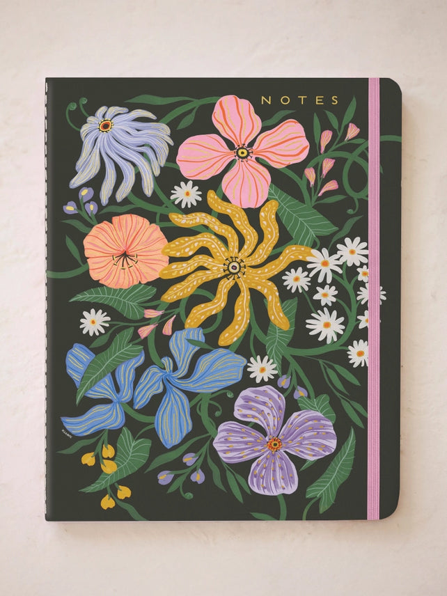 Notes notebook with dark floral cover, colorful blooms, and stitched side binding