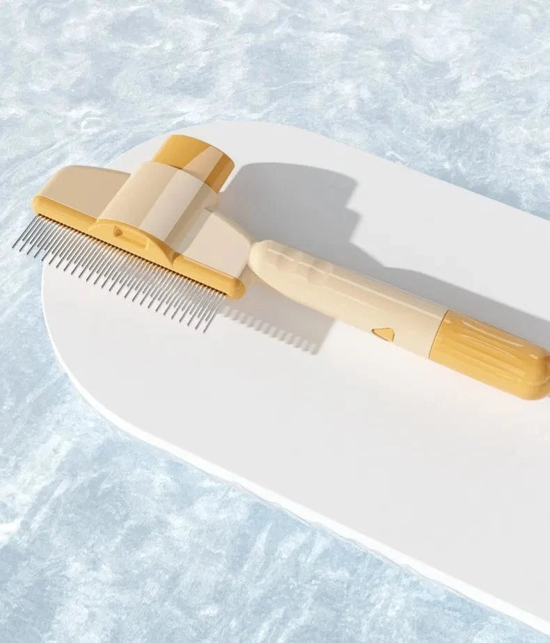 Self-cleaning pet comb with stainless steel teeth on beige-and-yellow handle