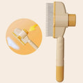 Self-cleaning pet comb with stainless steel teeth, beige handle with gold cap