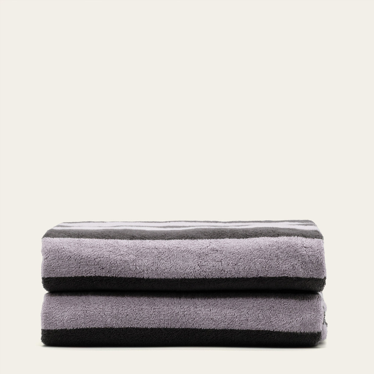 Australian cotton towels, lilac-gray folded bath sheet stack, plush terry cloth