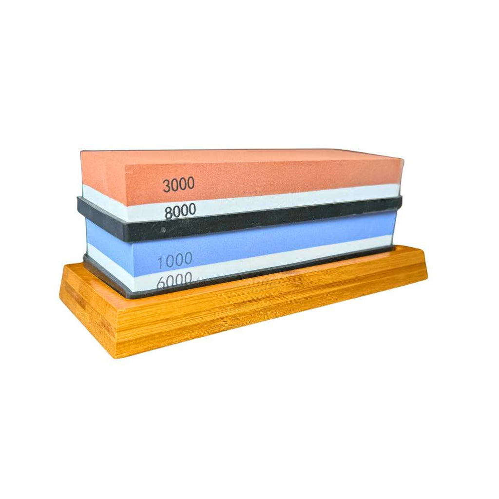 Sharpening stone set with orange 3000/8000 and blue 1000/6000 grit on wood base