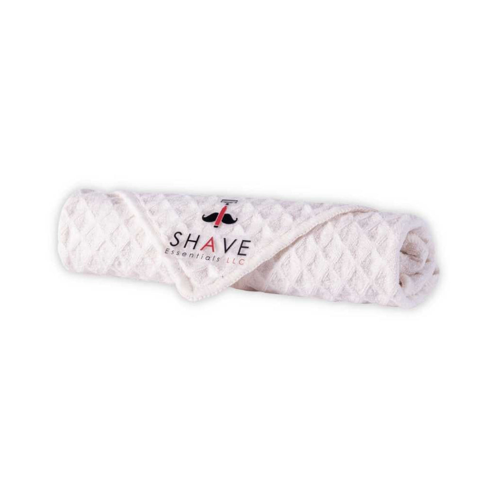 White textured grooming headband/cloth with SHAVE Essentials logo