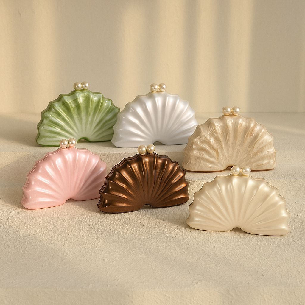 Shell acrylic clutches with pearl-look clasps in multiple colors: green, white, pink, bronze