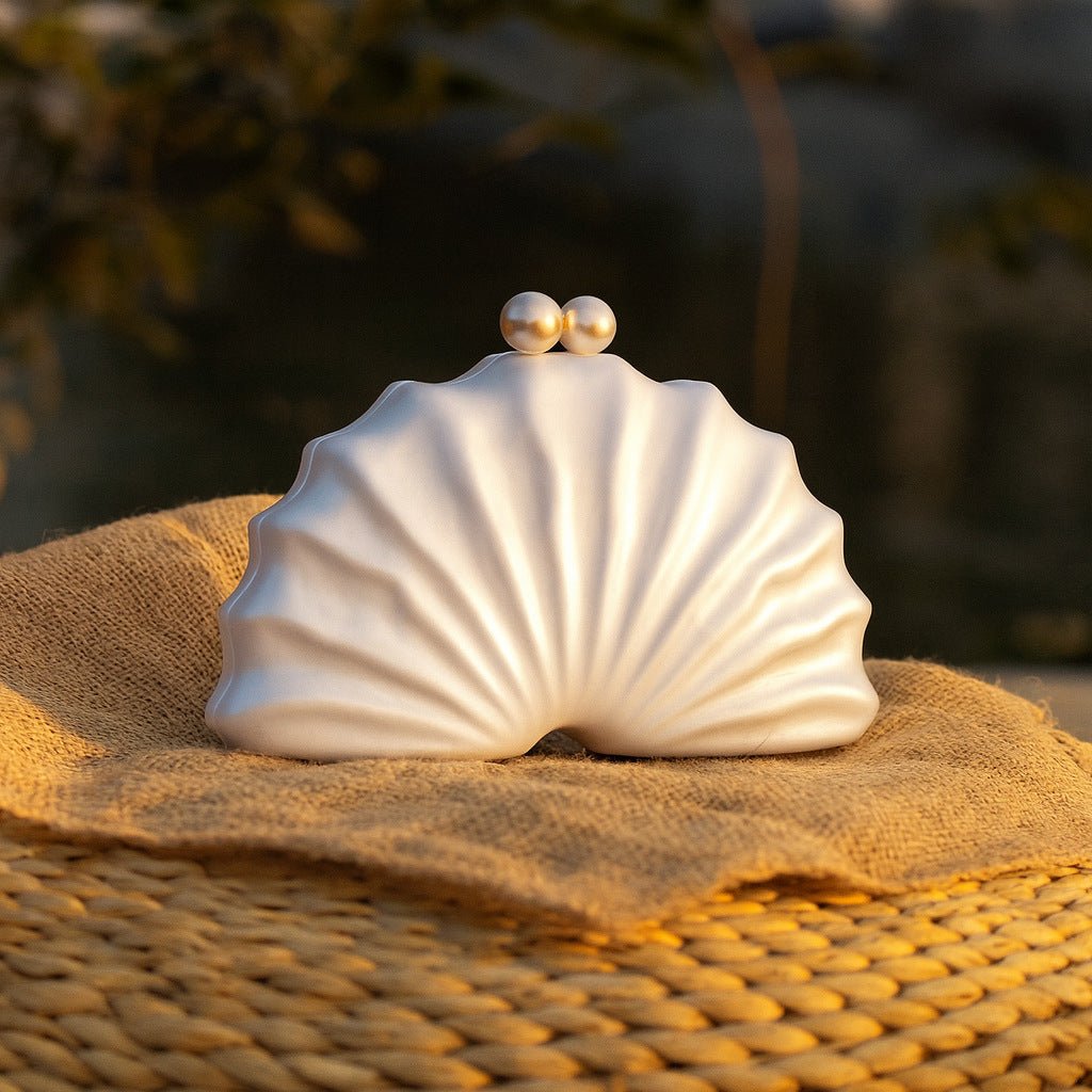 White shell acrylic clutch evening bag with pearl-look top clasp