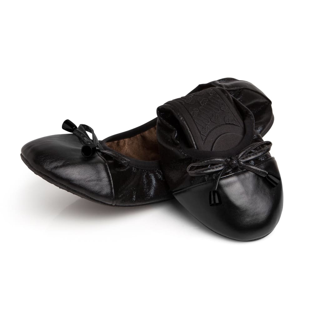 Black leather-look ballet flats with bow ties and textured sole detail