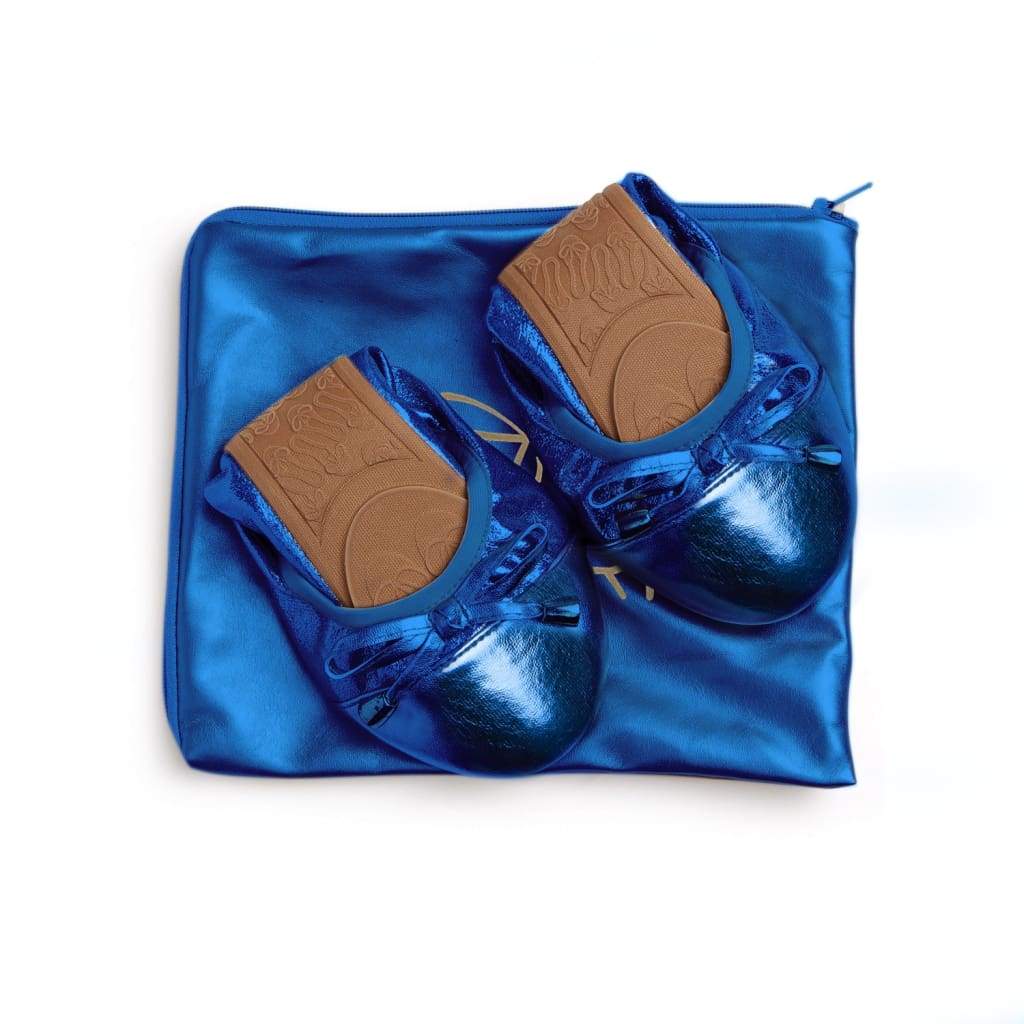 Pair of cobalt blue glossy flats with ribbon lace-up ties