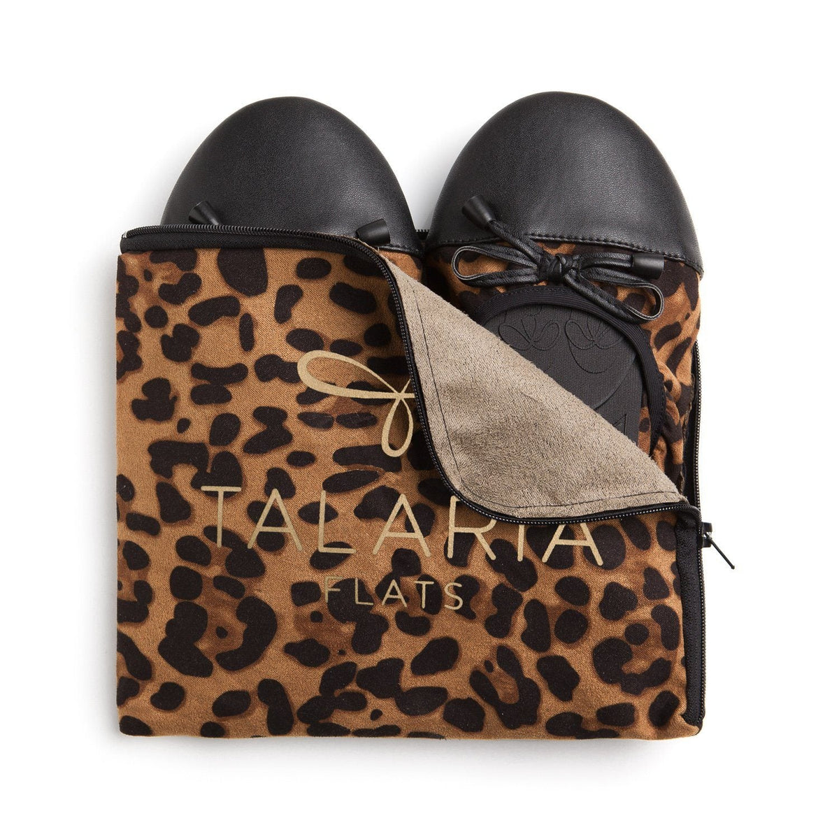 Leopard print flats with black toe cap and bow laces, shown in pouch