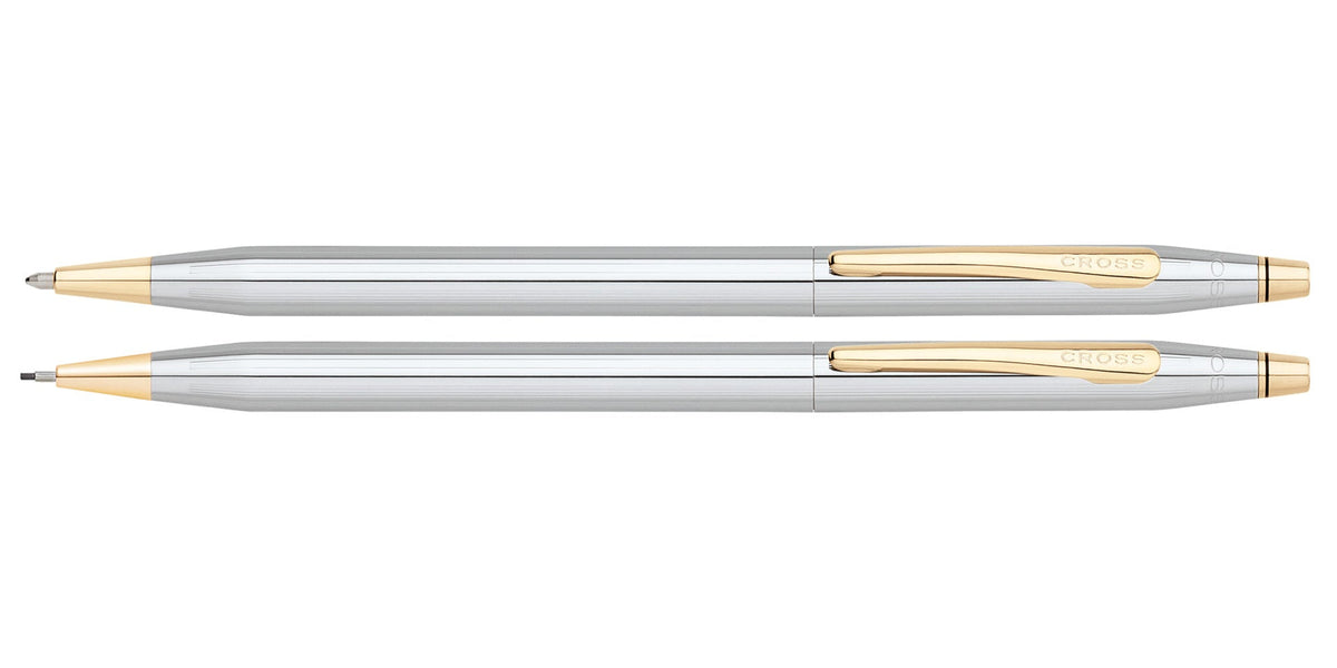 Pen and pencil set, two side-by-side silver pens with gold trim details