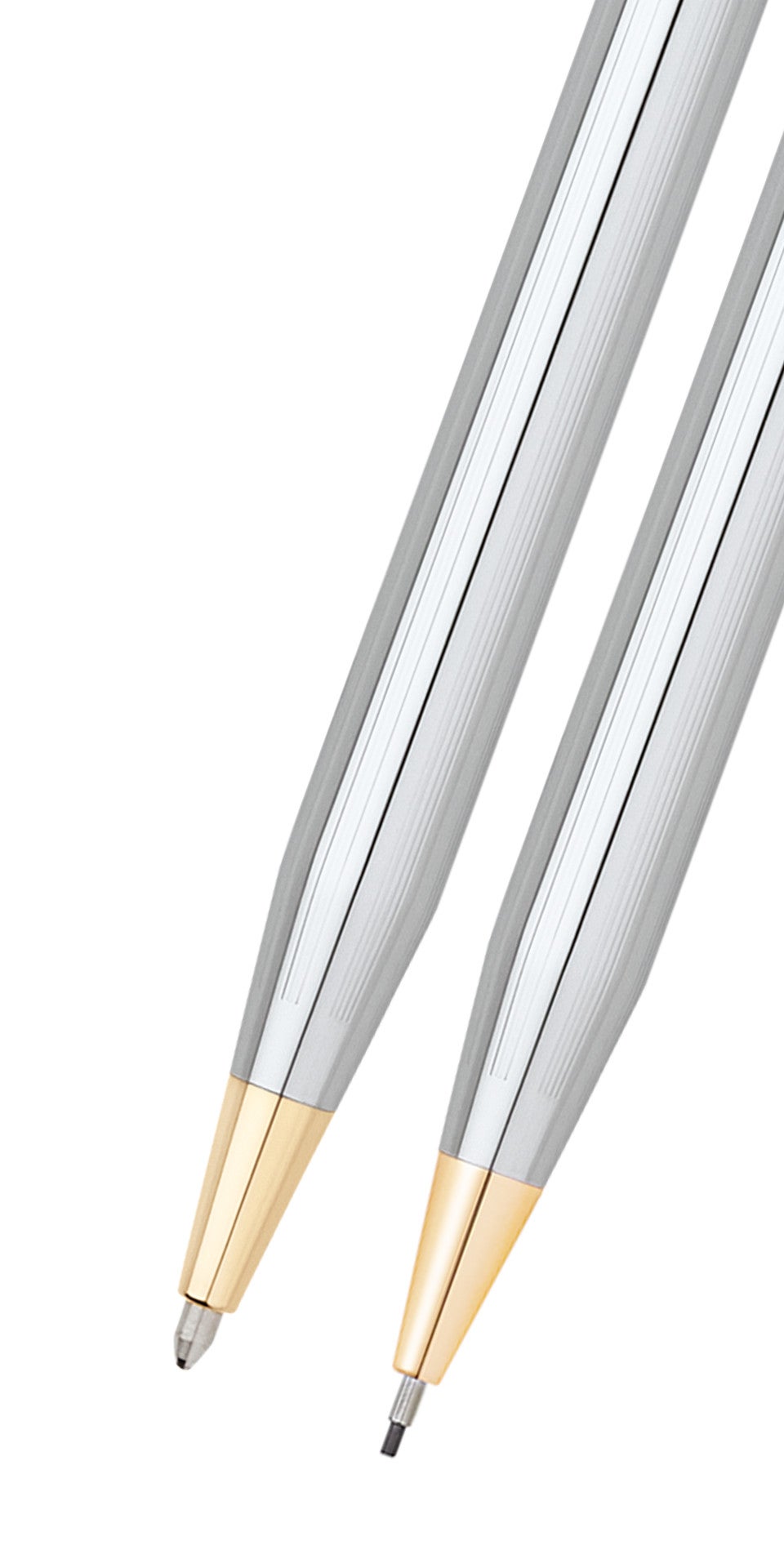 Pen and pencil set, angled view of silver barrels with gold ends