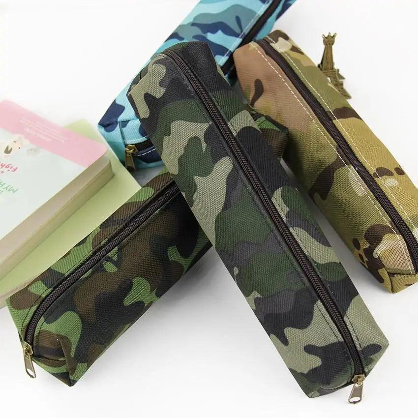 Three zippered camouflage pencil pouches in blue, green, and tan.
