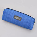 Small waterproof pencil case in bright blue fabric with zipper and centered brand patch