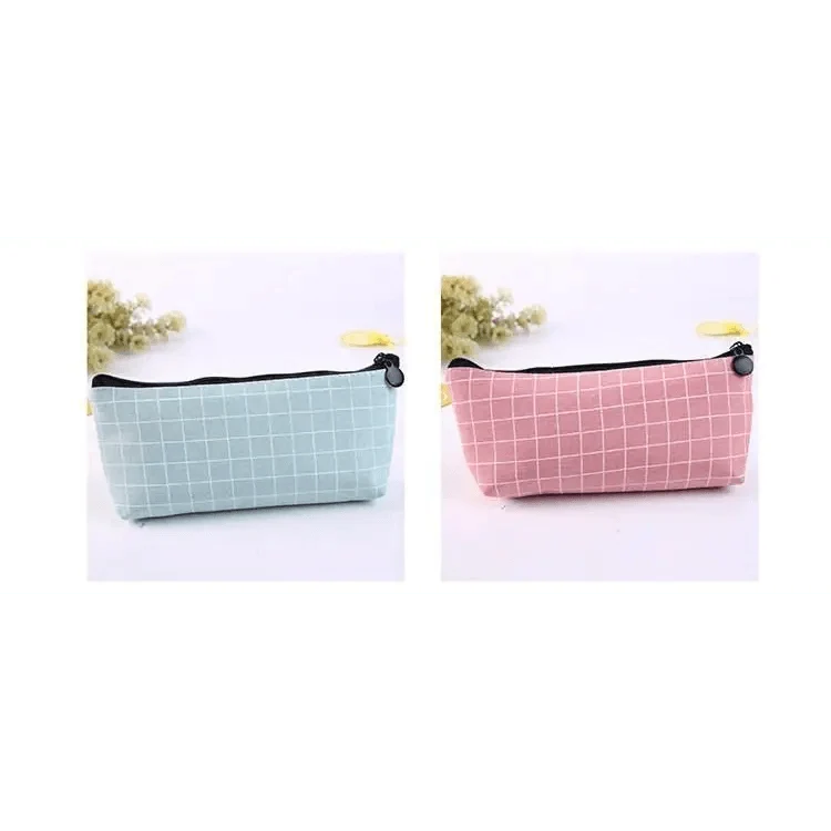 Light blue and pink grid pencil cases with black zippers and round pull tabs.