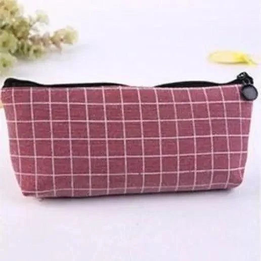 Pink grid pencil case with black zipper and round pull tab