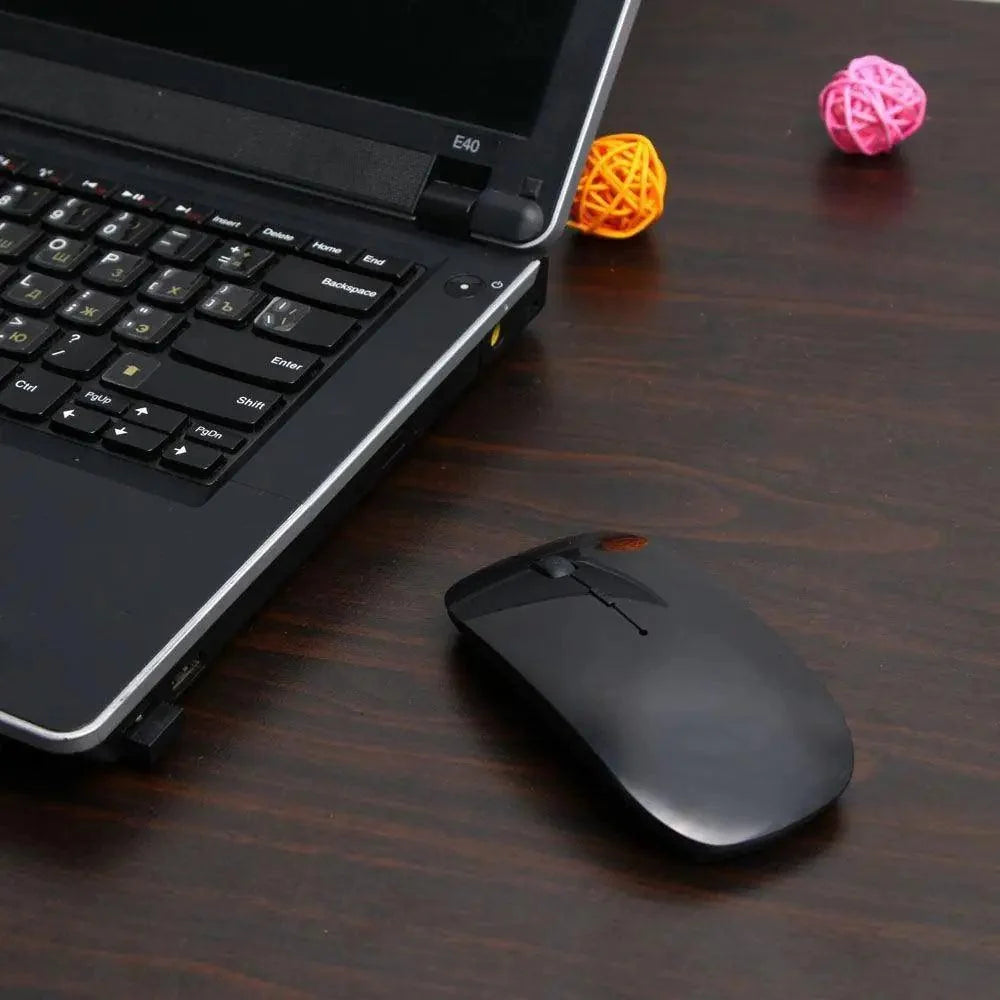 Black wireless optical mouse with scroll wheel