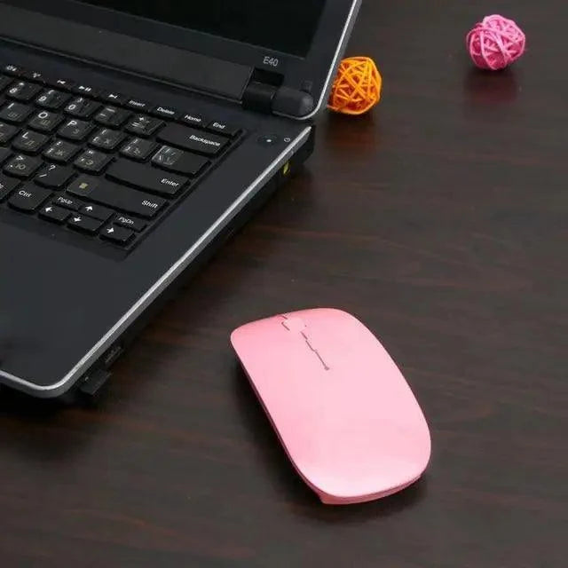 Pink wireless optical mouse with slim design