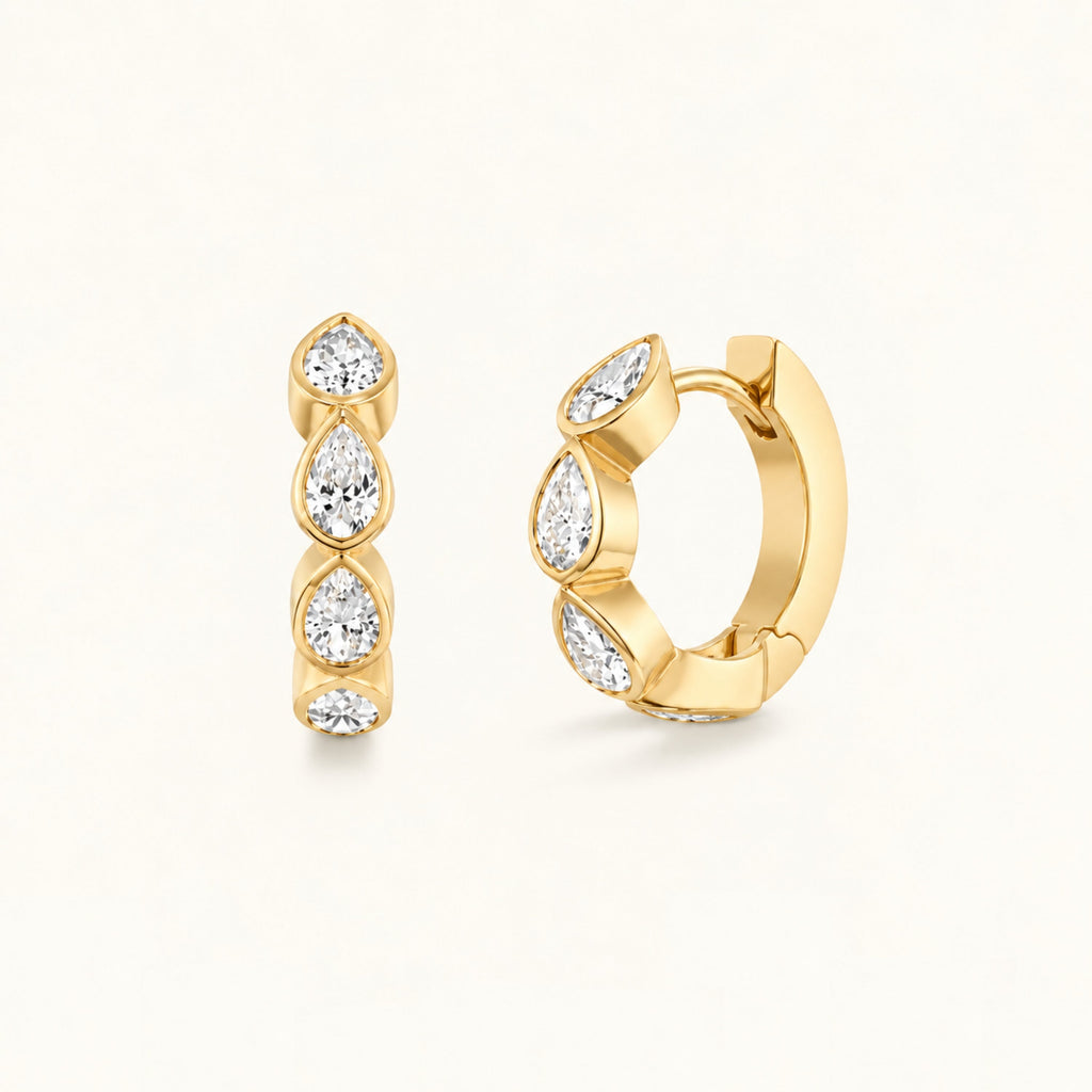Small marquise hoop earrings in gold with clear marquise-cut stones