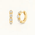 Small marquise hoop earrings in gold with clear marquise-cut stones