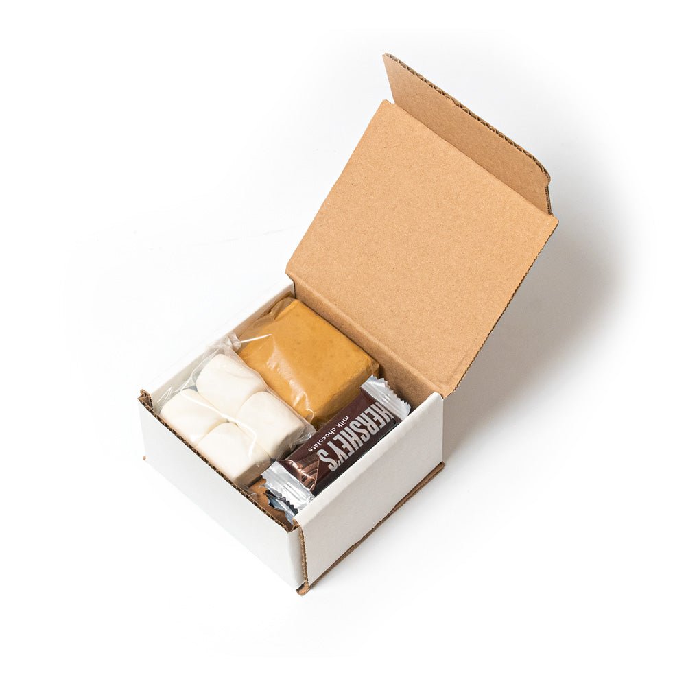 S'mores kit open box with graham crackers, marshmallows, and chocolate bars