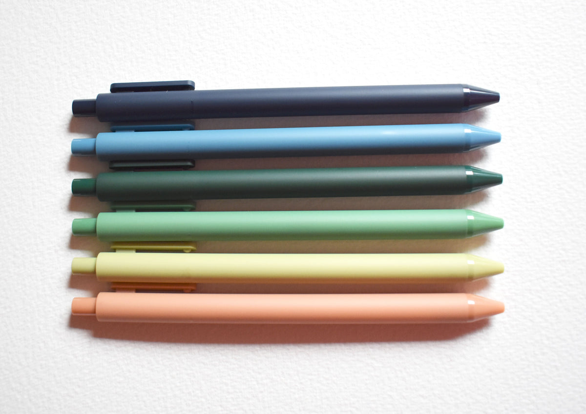 Neutrals gel pen set with capped pens in dark gray, teal, lime, and peach