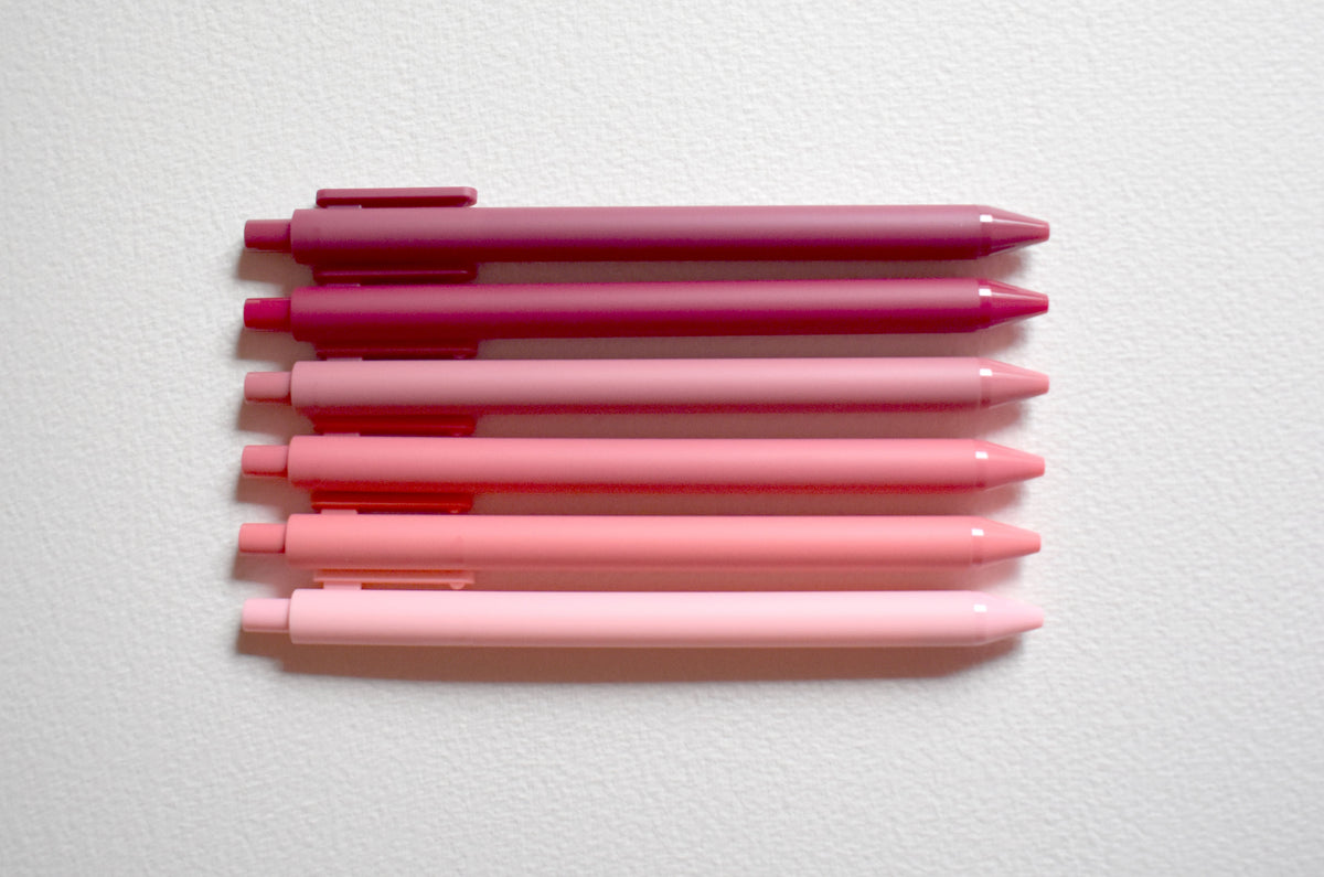 Pink gel pen set with capped pens in varying blush tones