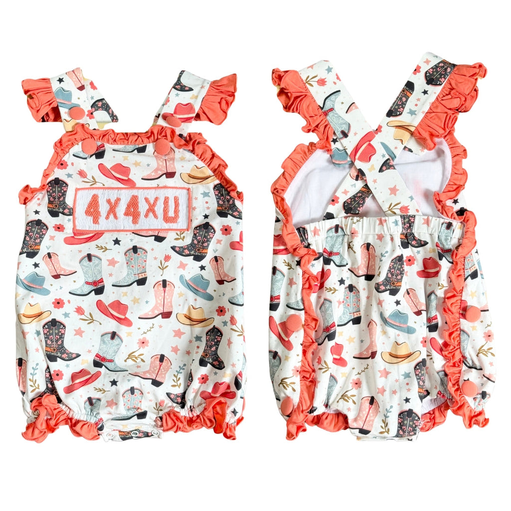 Girls smocked sunsuit with star and rocket print, coral ruffle trim, wide leg