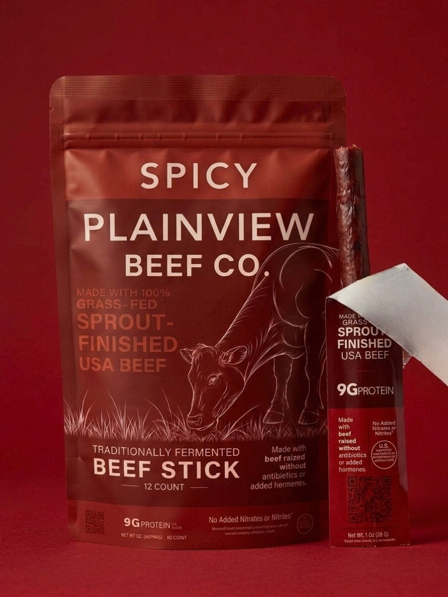 Spicy beef stick pouch with red label and matching stick sleeve, 9g protein