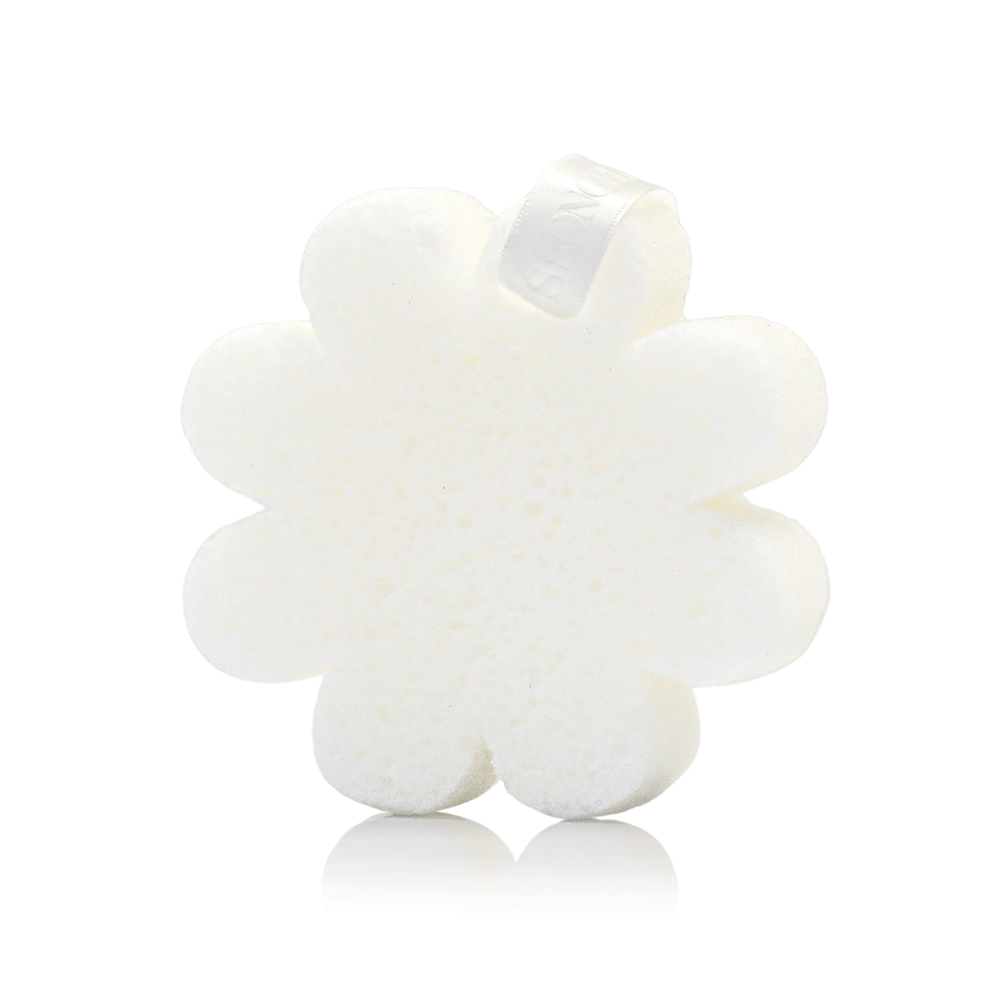 White flower-shaped body cleansing sponge with textured surface