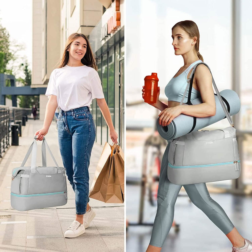 Light gray sports travel duffel bag worn on shoulder with matching small pouch