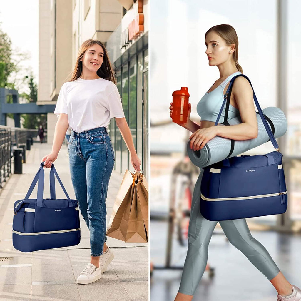 Dark blue sports travel duffel bag on shoulder with matching small zip pouch