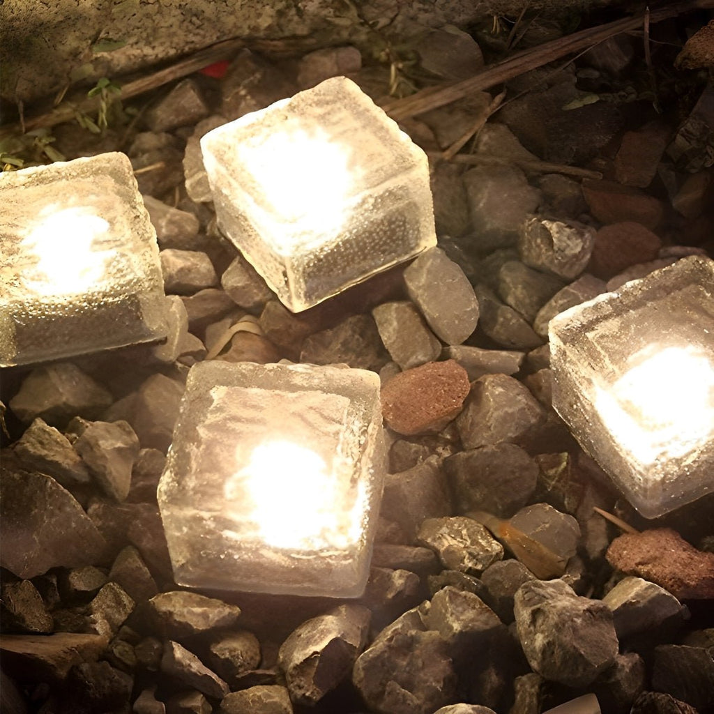 Solar LED ice brick path light with warm white glow, square translucent brick