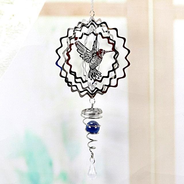 Round scalloped metal wind chime with owl pattern, blue bead, and clear crystal drop