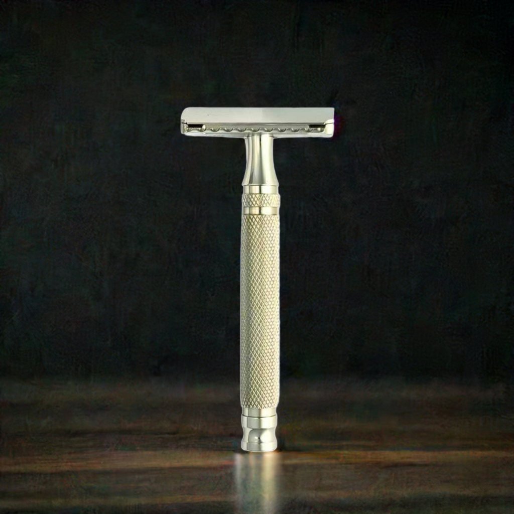 Double-edge safety razor with textured grip handle and polished metal head
