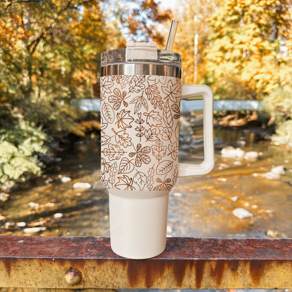 40 oz outdoor tumbler with clear lid and straw, cream base and orange leaf pattern