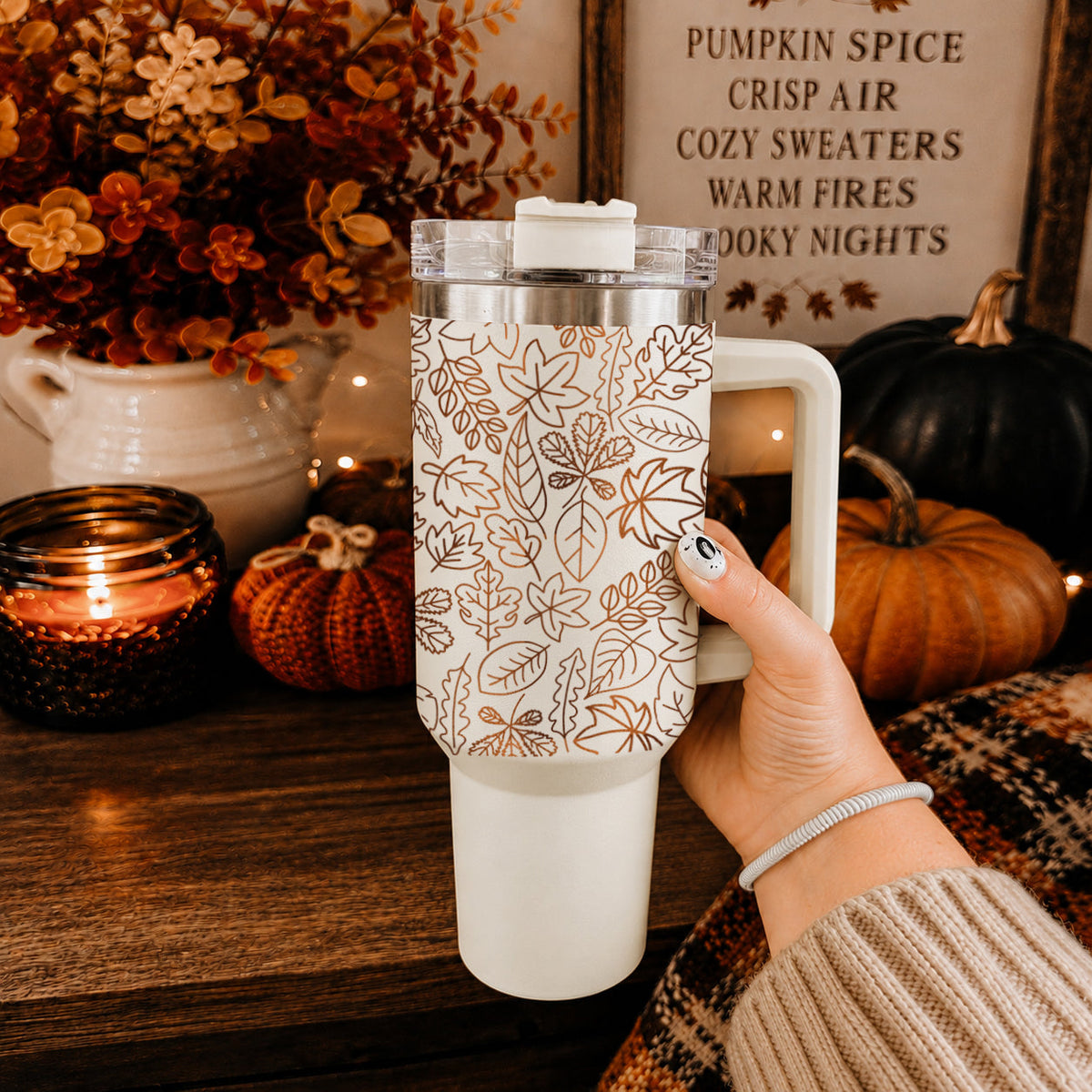 40oz insulated tumbler with orange leaf print, clear lid, and white handle