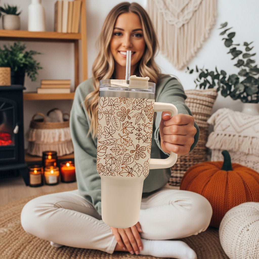 40 oz tumbler in cream with clear lid and straw, orange leaf print design