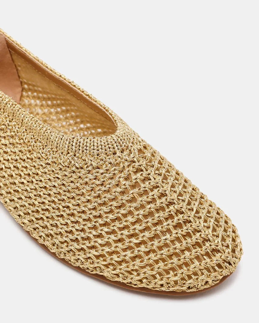 Close-up of champagne woven slip-on flat with textured chain knit upper