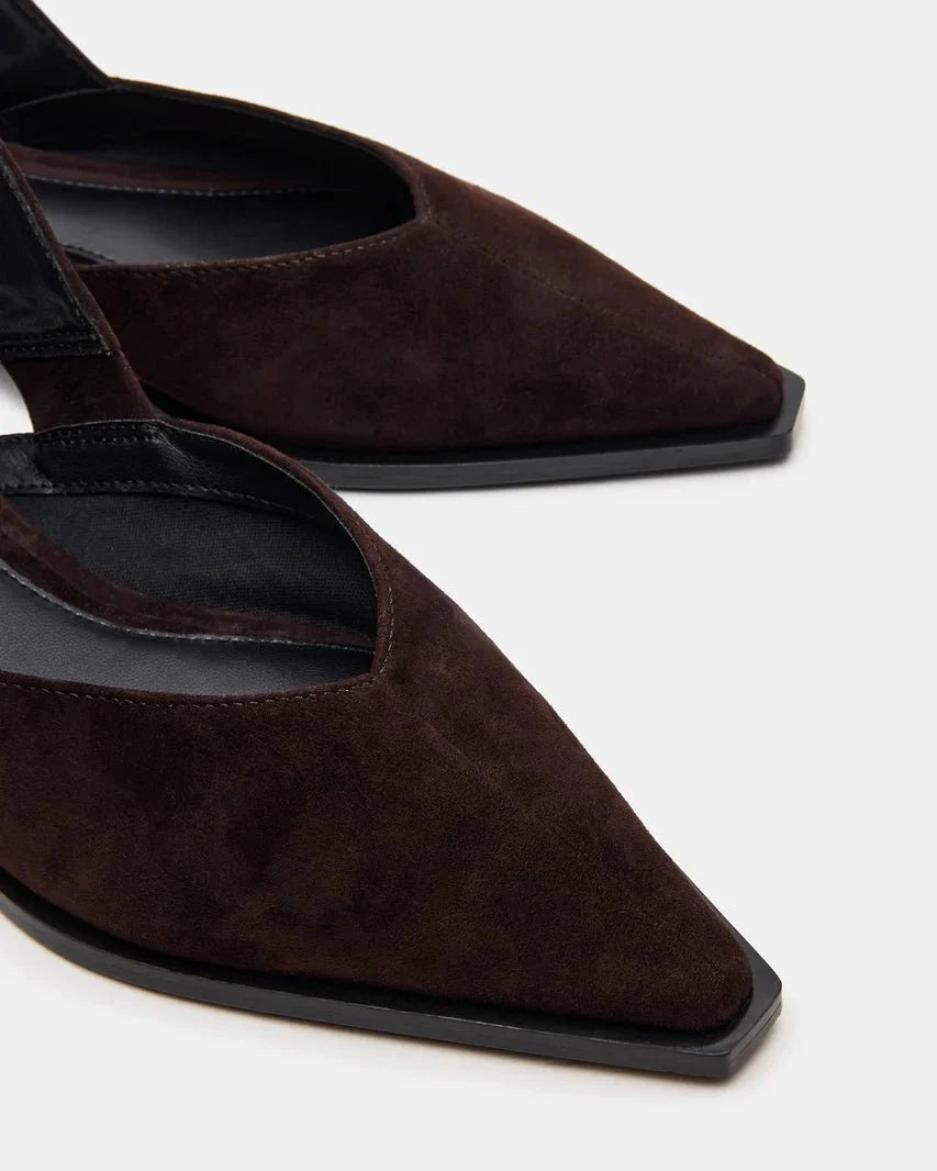 Brown suede pointed-toe flat with gold buckle and stitched interior