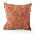 Orange stonewashed throw pillow with raised leaf embroidery, square