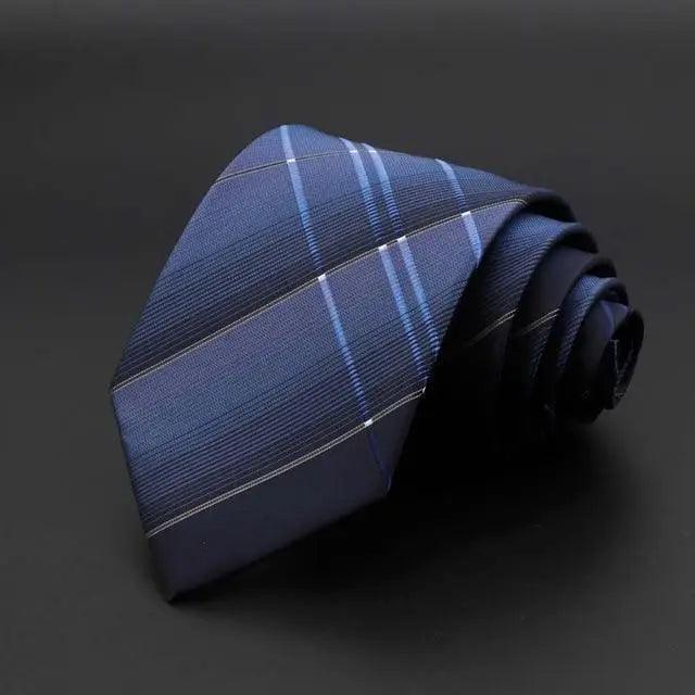 Men's necktie in blue with diagonal plaid lines and subtle crosshatch weave.
