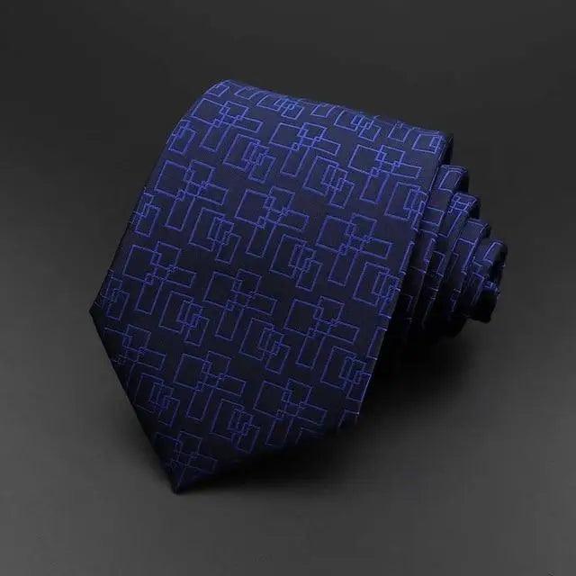 Men's necktie in deep blue with geometric lattice pattern and raised weave texture.