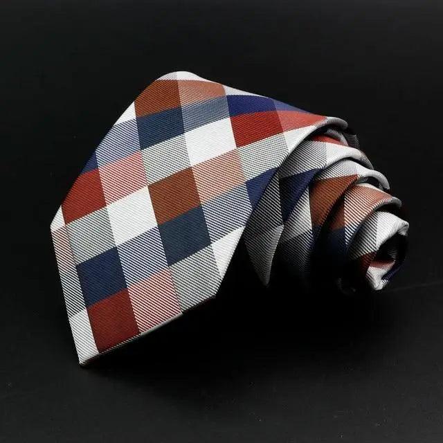 Men's necktie in multicolor patchwork checker with white base and woven texture.