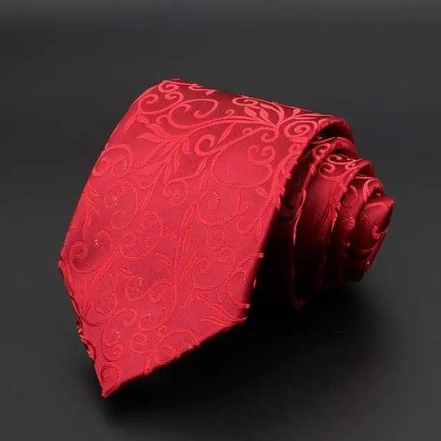 Red jacquard necktie with subtle floral pattern and woven texture