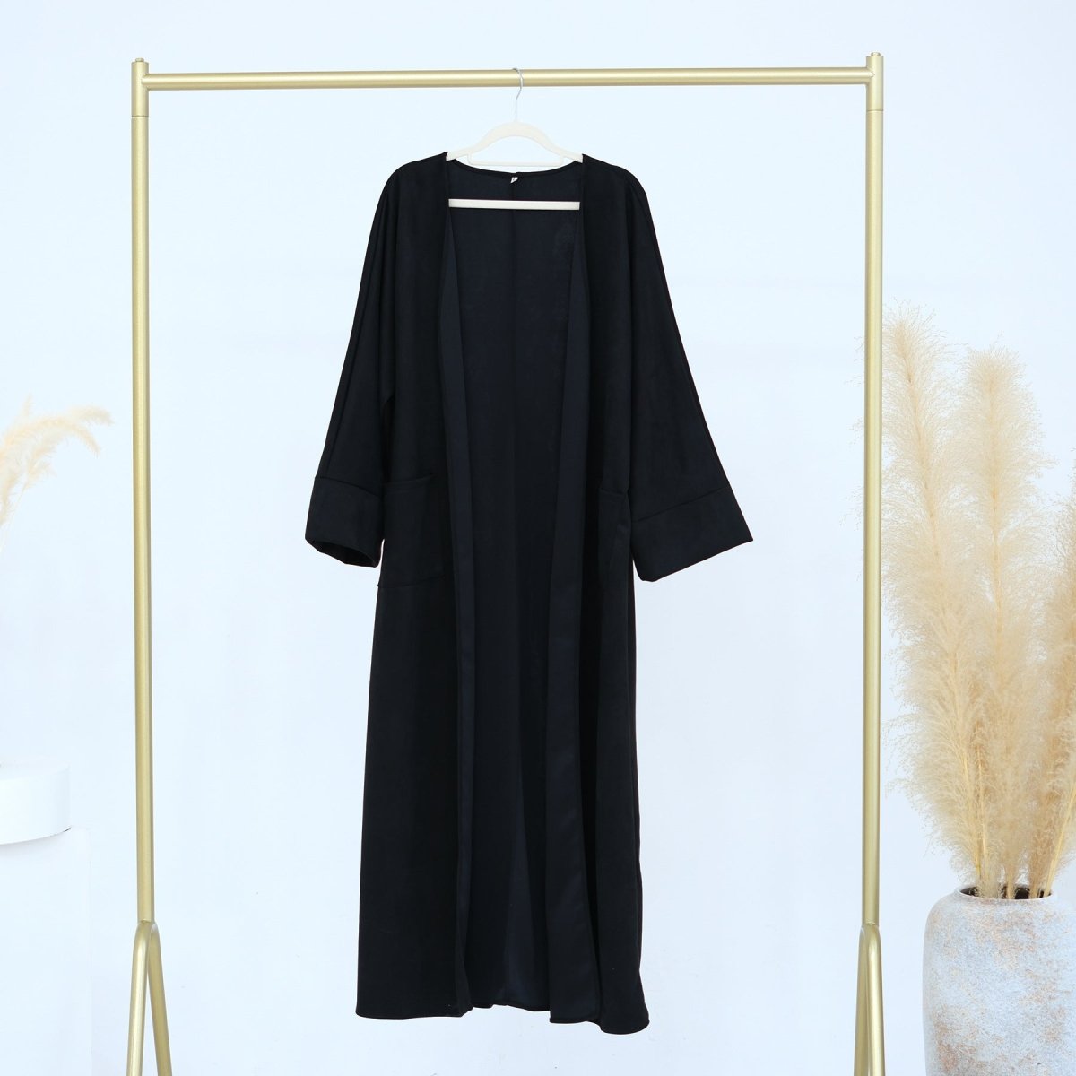 Black suede open-front long abaya cardigan with 3/4 sleeves and deep front opening