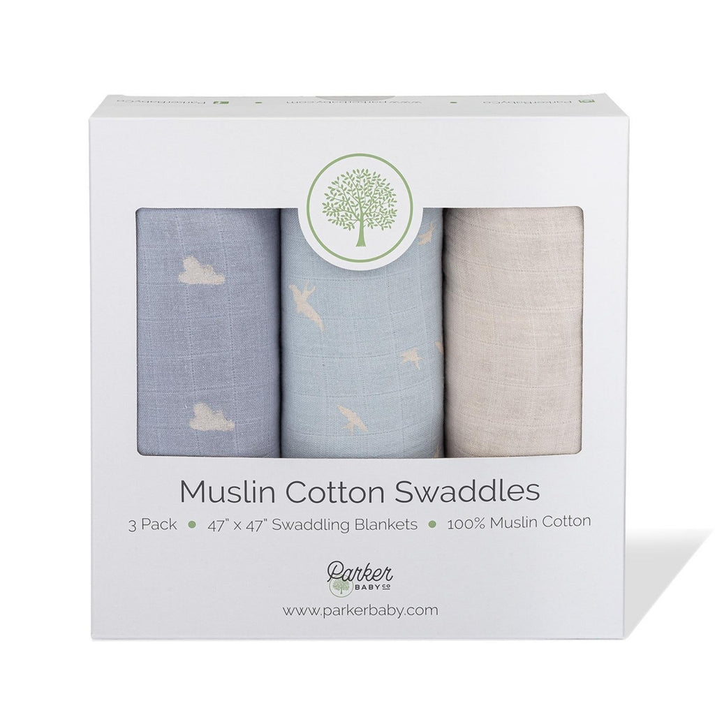 Boxed set of three muslin cotton swaddles in blue and beige with cloud and bird prints