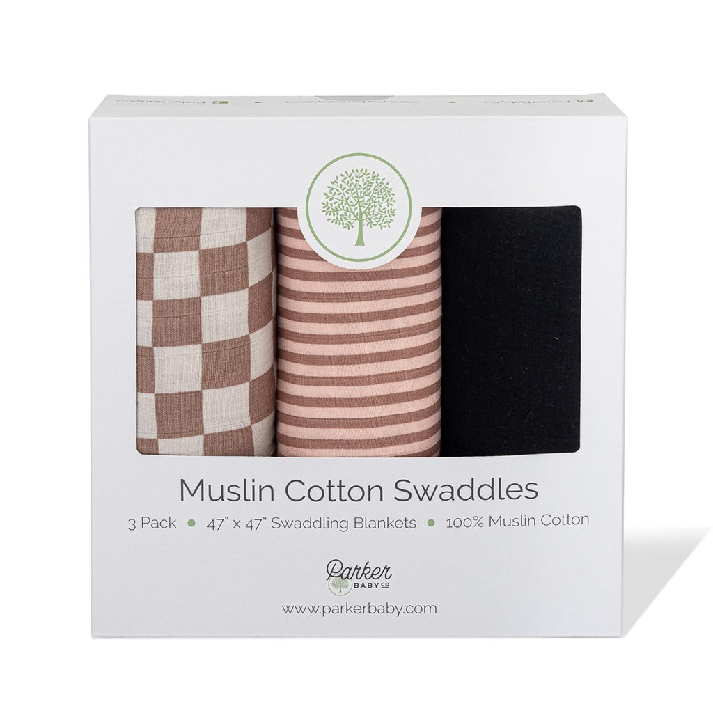 Boxed muslin swaddle set with three blankets: brown checks, rose stripes, and dark solid