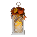 White metal harvest lantern with LED flickering candle, pumpkin and fall flowers on top